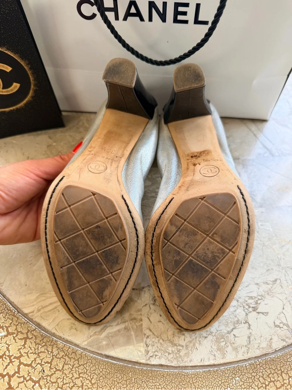 CHANEL Silver Leather Ballet Flats with Black Cap Toe